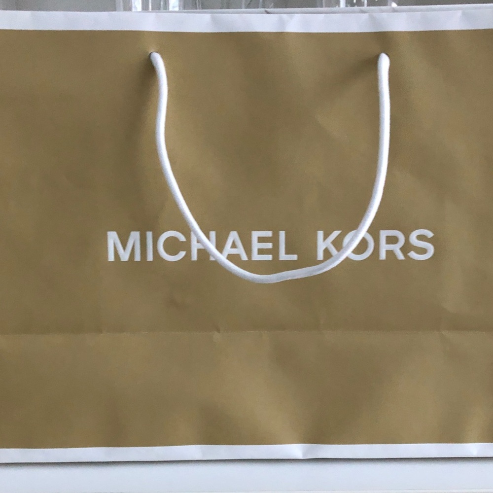 Michael Kors 11x15 paper bag with white tissue paper.